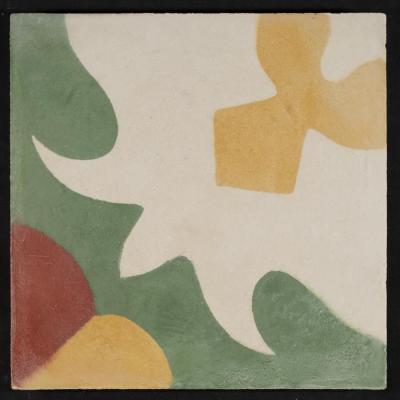 A Coloured Cement Tile and the Mold Used to Manufacture It