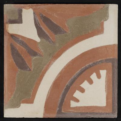 A Coloured Cement Tile and the Mold Used to Manufacture It
