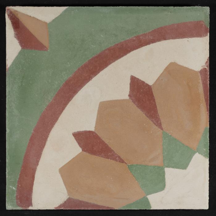 بلاطة إسمنتية ملونة والقالب المستخدم لصناعتها 