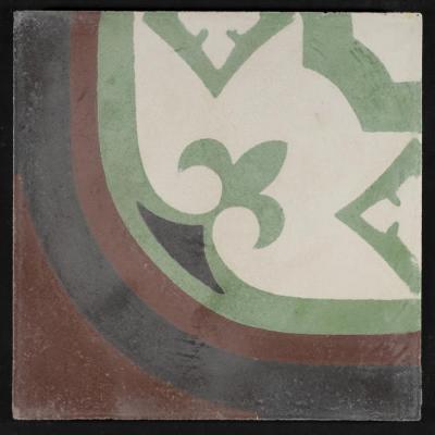 بلاطة إسمنتية ملونة والقالب المستخدم لصناعتها 