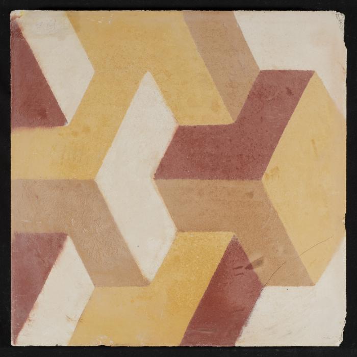 A Coloured Cement Tile and the Mold Used to Manufacture It