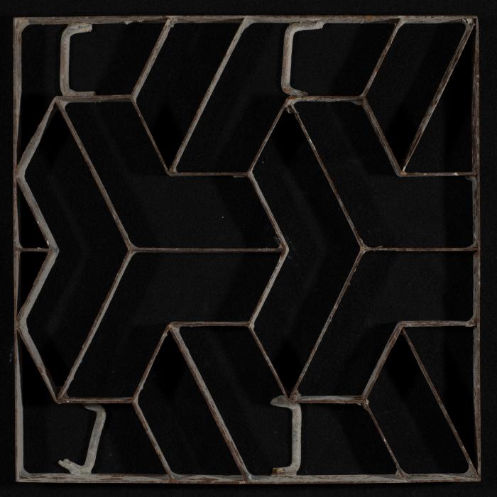 A Coloured Cement Tile and the Mold Used to Manufacture It