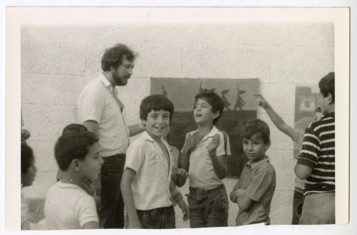 Sliman Mansour with a number of children, Deir Ghassaneh, 1984