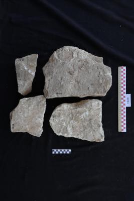 Parts of a sandstone headstone, Al-Qarara, 2025