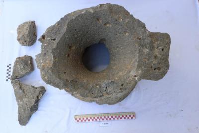 Part of a basalt stone grinder, Al-Qarara,2025