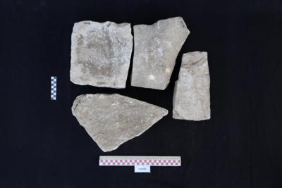 Parts of a sandstone headstone, Al-Qarara, 2025
