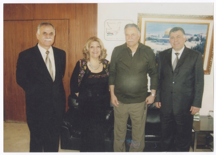 Maha El-Saca with members from the Palestinian Liberation Organization, in the Organization's office in Bethlehem