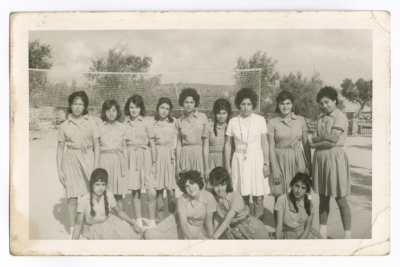Maha El-Saca amongst the elementary football team for girls in Beit Jala