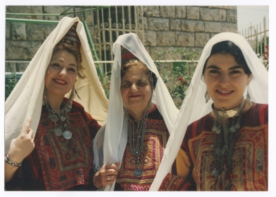 Maha El-Saca, her mother "Ellen", and her daughter "Iman" wearing the Bethlehem bride traditional dress "Al-Malak"