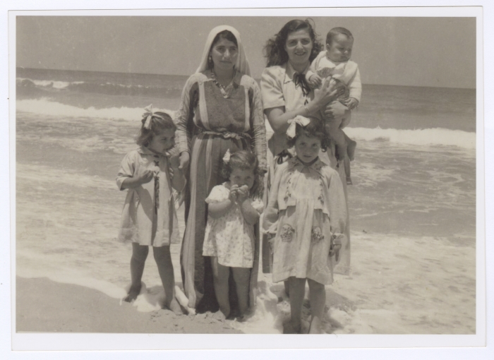 Ellen Abu Rumman and Her Children with the Housekeeper on the Gaza Beach, 1953