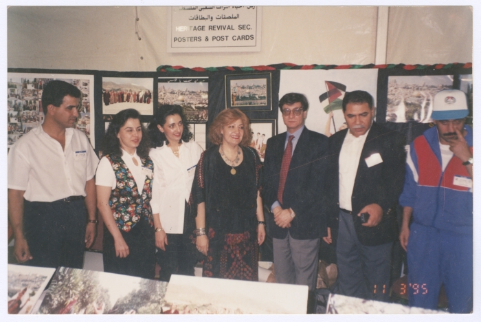 A group portrait of people with Poet Mahmoud Darwish in Jerusalem's Festival 
