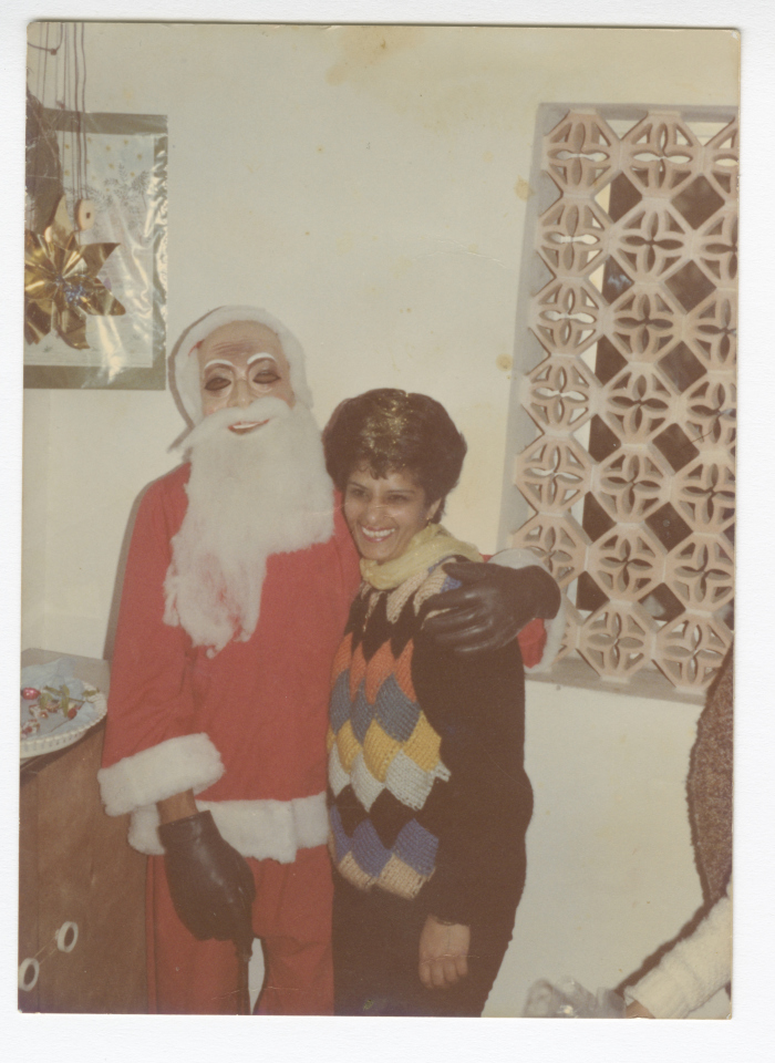 Adele Azar with Santa Claus, Gaza, 1990-1999