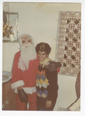 Adele Azar with Santa Claus, Gaza, 1990-1999