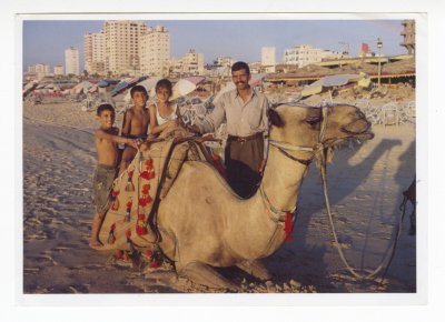 Saleem Dawood Azar and His Children at the Gaza Beach 