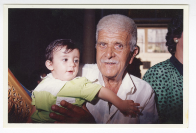 Dawood Azar Holding His Grandson Dawood, Gaza, 1990-1999