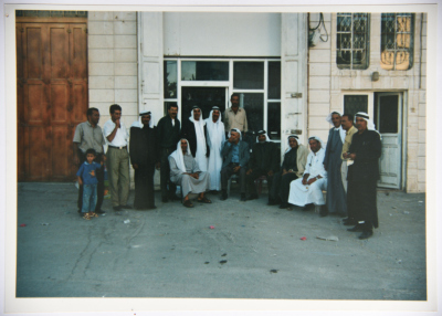 A Photograph of a Group of Men at a Tribe Conciliation in Raʾs al-ʿĀrud