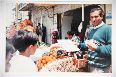 A Photograph of a Man at a Food Market Hebron, 1990-1999
