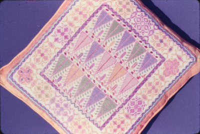 A Cushion Embroidered the Association for the Development of Palestinian Camps (INAASH) 