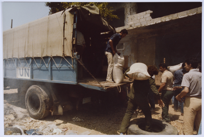 Distributing Food Rations in a Palestinian Refugee Camp, Lebanon, 1985 -1987