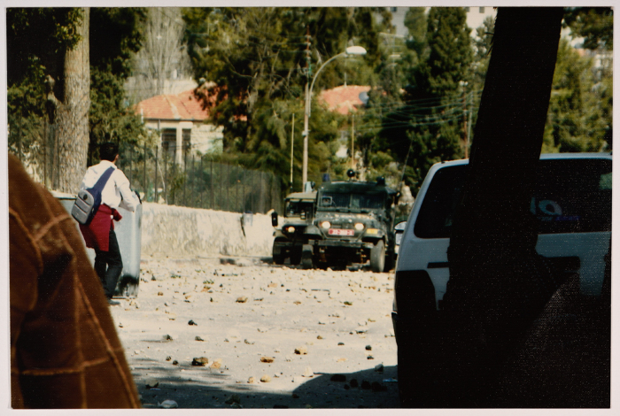 A Child Facing the Israeli Occupation Jeeps 
