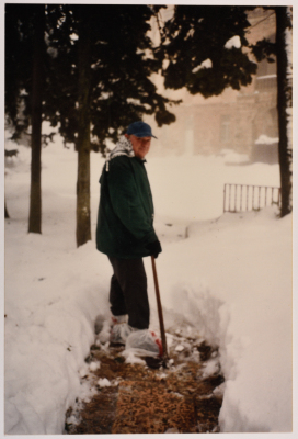 A Man Pushing His Way through Snow
