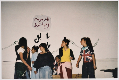 A Group of Girls While Conducting a Performance 