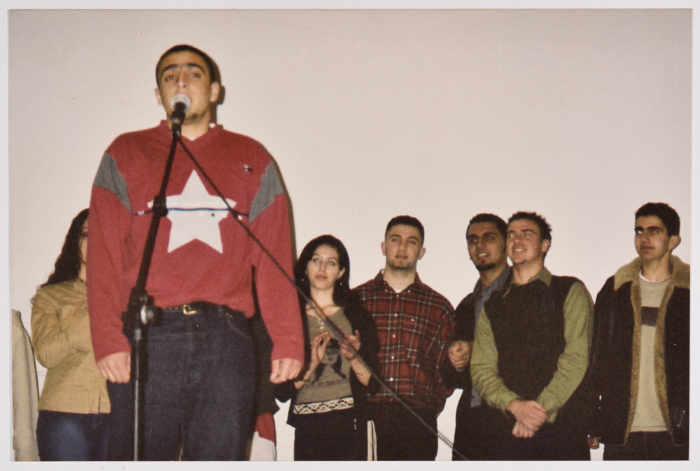 A Group of People Standing on the Stage 
