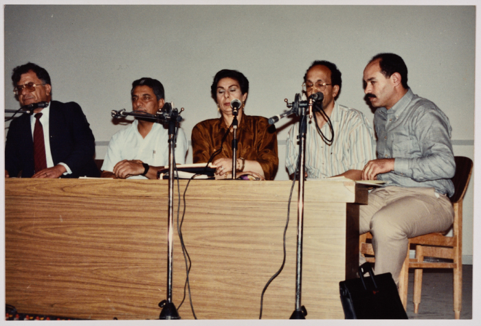 A Group of People Standing on a Rostrum 
