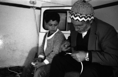 Mohammad Abu Libdeh and His Father During Curfew, al-Amari Camp, 1988