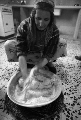 Um ʿadnan Baking Palestinian Taboon Bread in al-Mazra'a ash-Sharqiyya Town , 1988