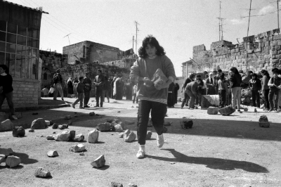 Young Girls Preparing Stones and Barricades for Clashes with Israeli Occupation Forces