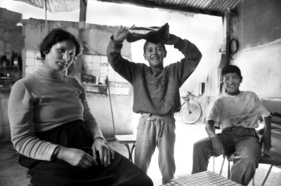 Two Young Boys With Their Mother
