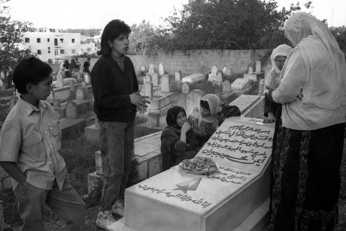 Women Reading Al-Fatiha Surah on the Souls of the Dead