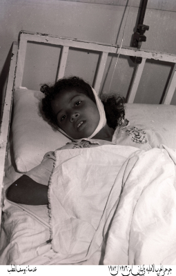 An injured woman during the civil war in Lebanon