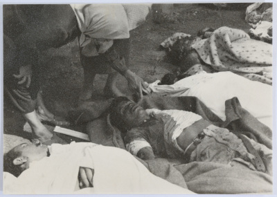 Two Women Examining Corpses 