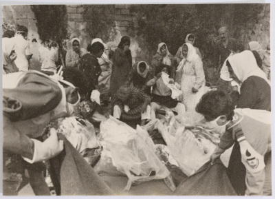 Families Examine Corpses 