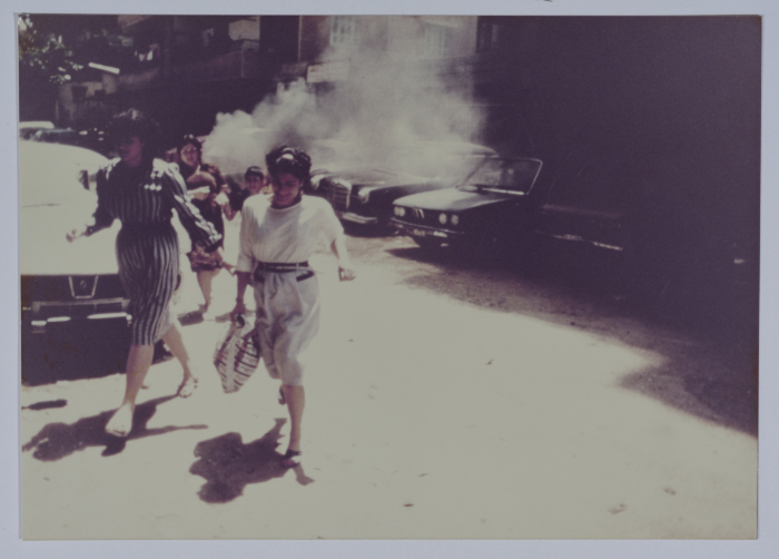 Women in Plainclothes Running Away from an Explosion 