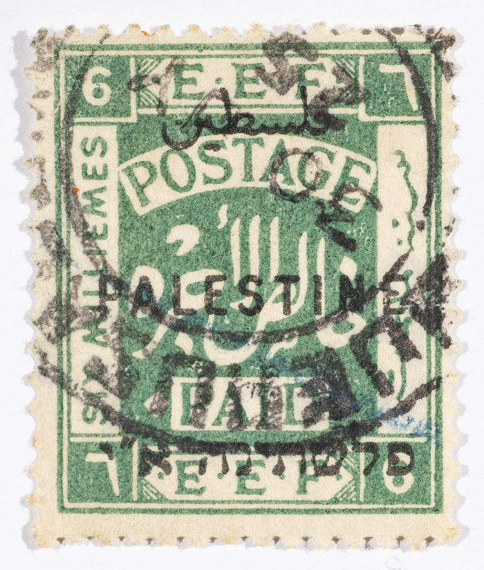 A postage stamp used in Palestine during the British Mandate