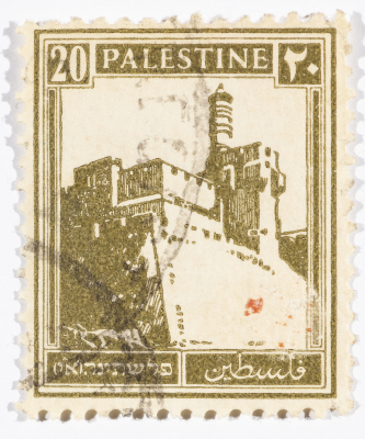 A postage stamp used in Palestine during the British Mandate