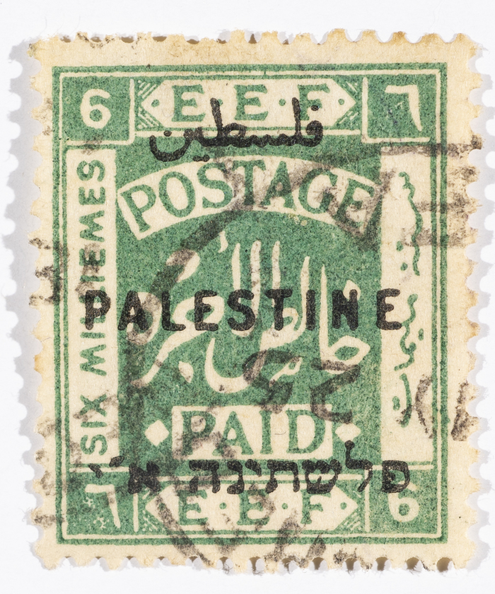 A postage stamp used in Palestine during the British Mandate