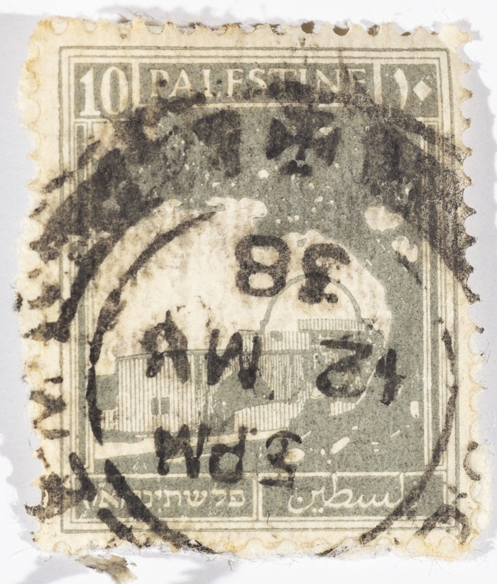 A postage stamp used in Palestine during the British Mandate