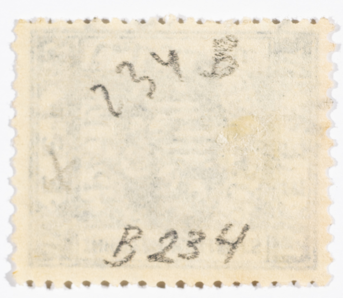 A postage stamp used in Palestine during the British Mandate