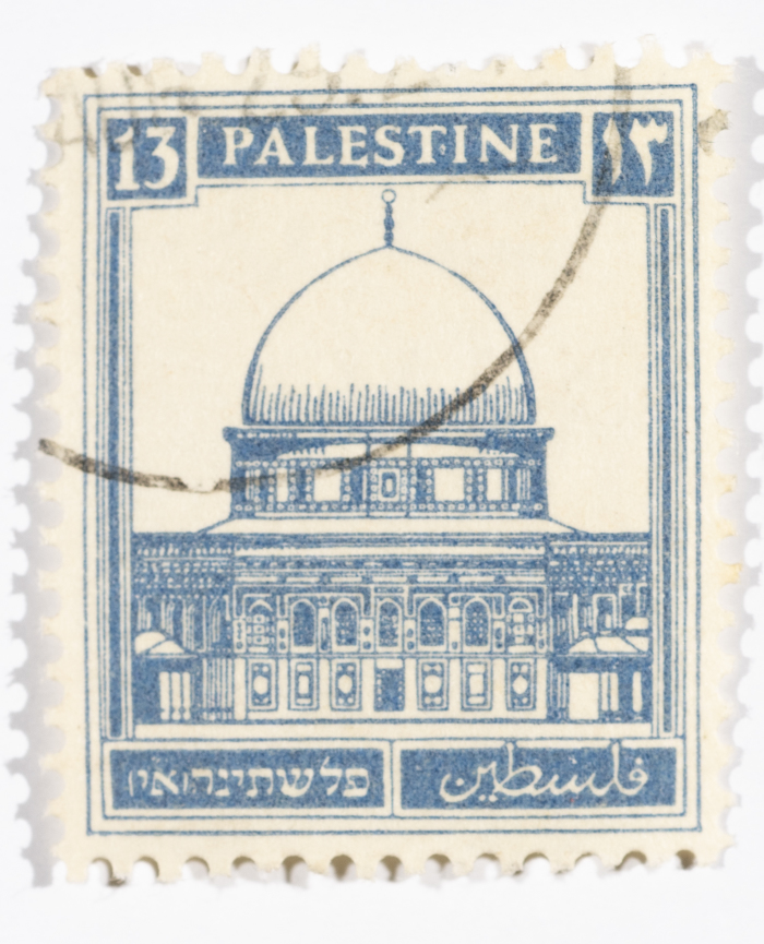 A postage stamp used in Palestine during the British Mandate