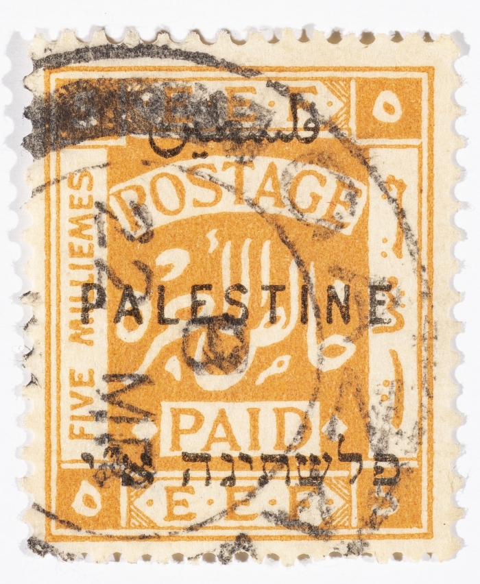 A postage stamp used in Palestine during the British Mandate