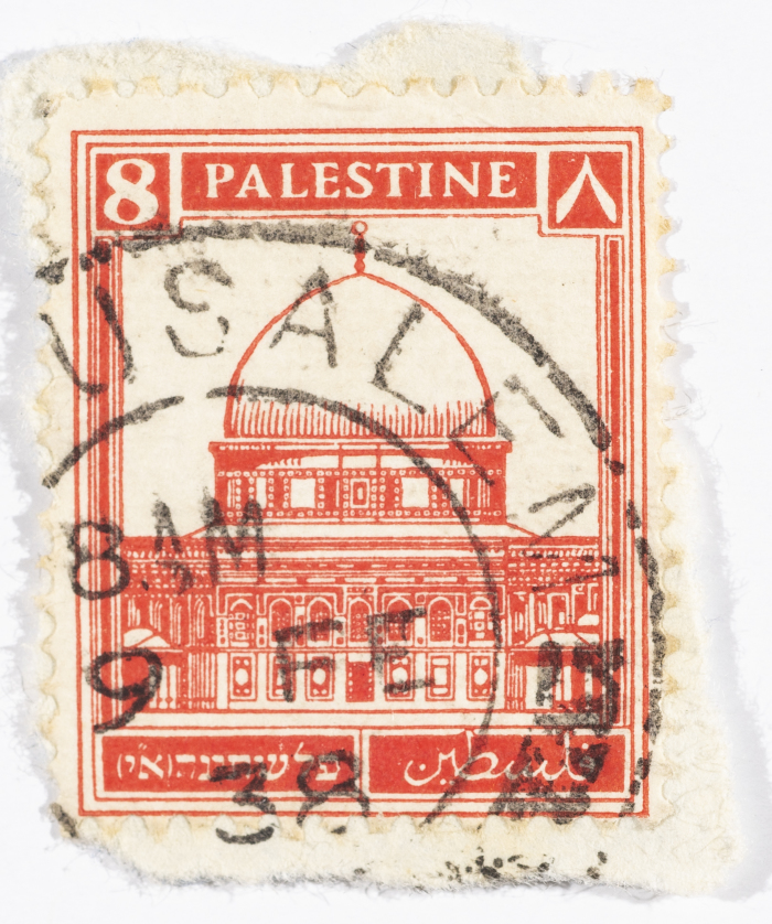 A postage stamp used in Palestine during the British Mandate