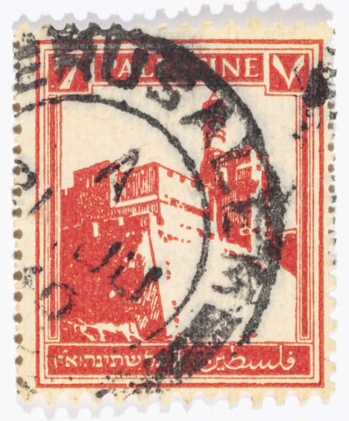 A postage stamp used in Palestine during the British Mandate