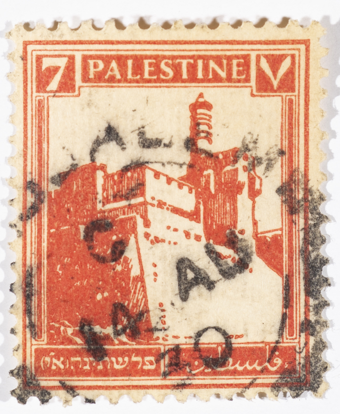 A postage stamp used in Palestine during the British Mandate