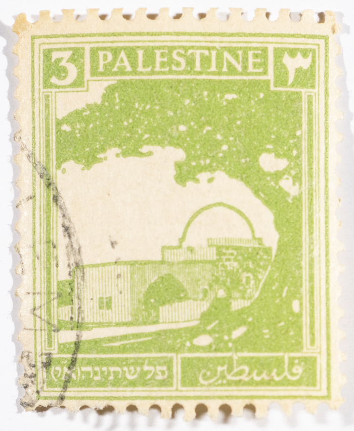 A postage stamp used in Palestine during the British Mandate