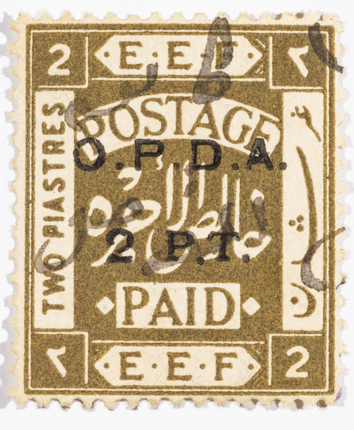 A postage stamp used in Palestine during the British Mandate