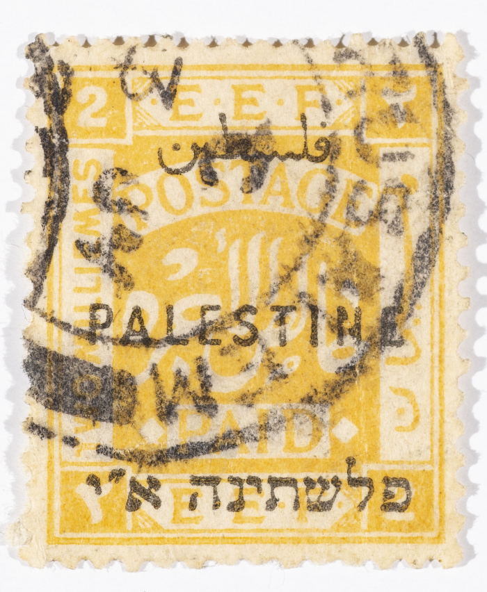 A postage stamp used in Palestine during the British Mandate